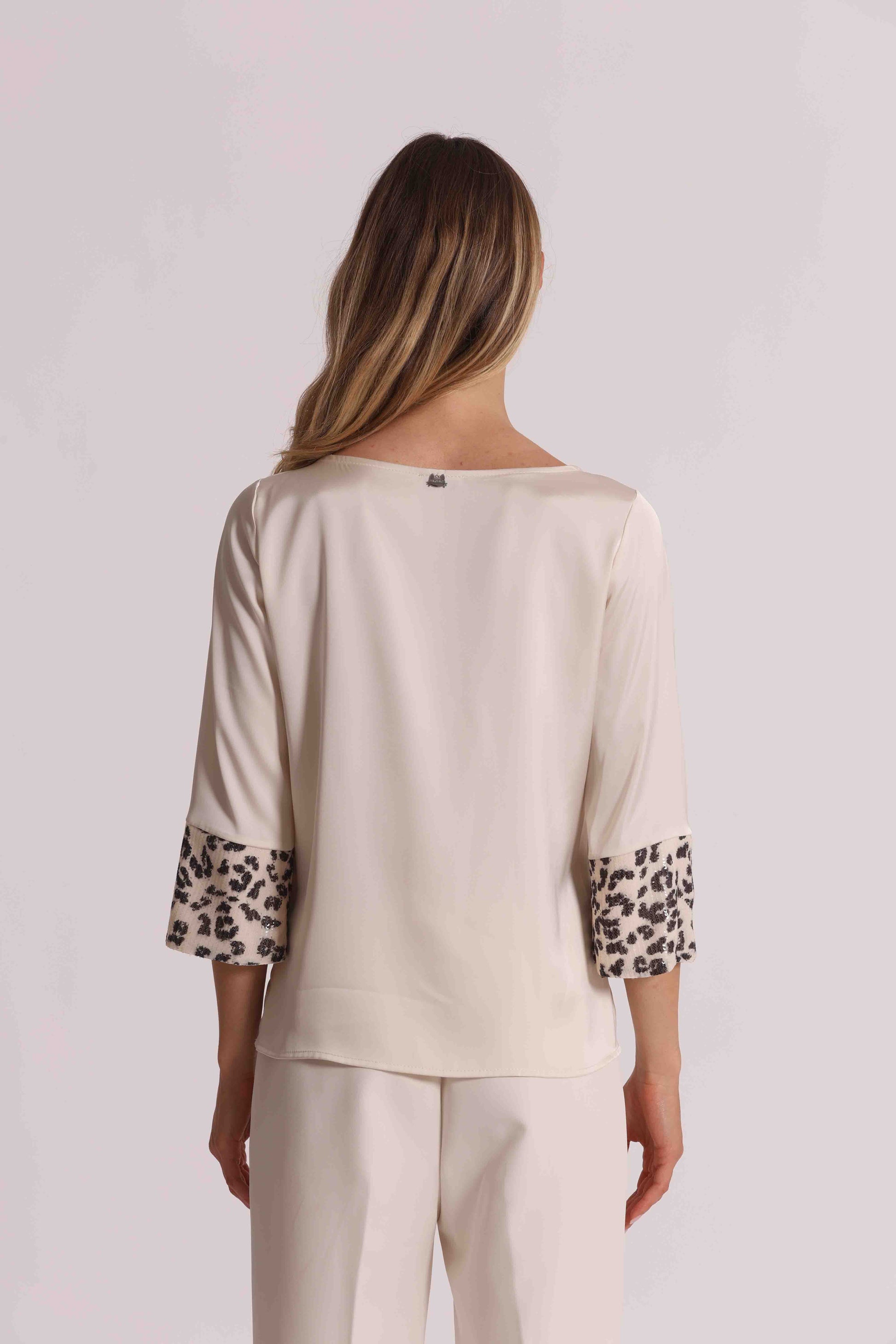 BLUSA CON PAILLETTES IN FANTASIA ANIMALIER