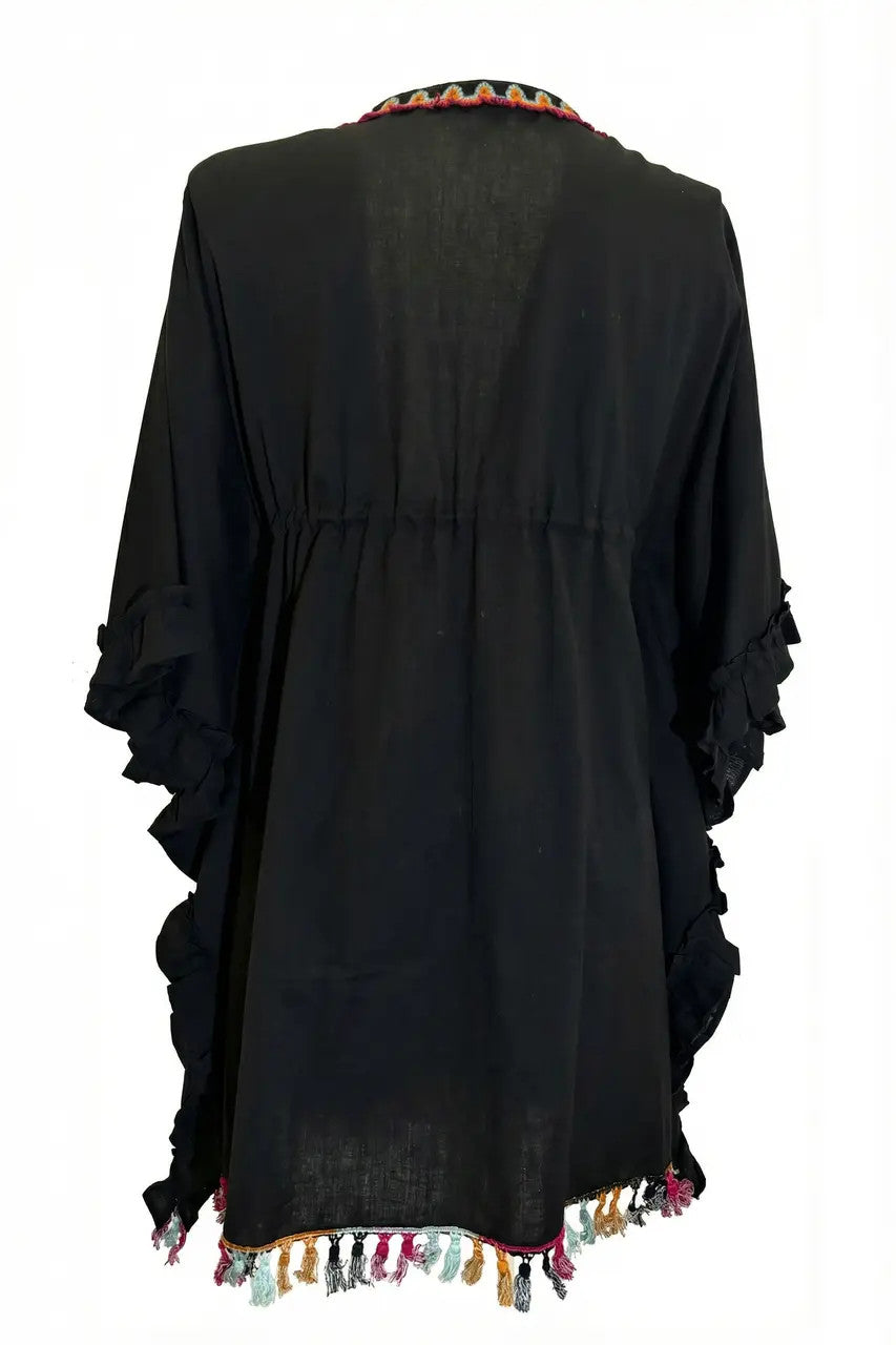 Poncho folk con ricami e nappine