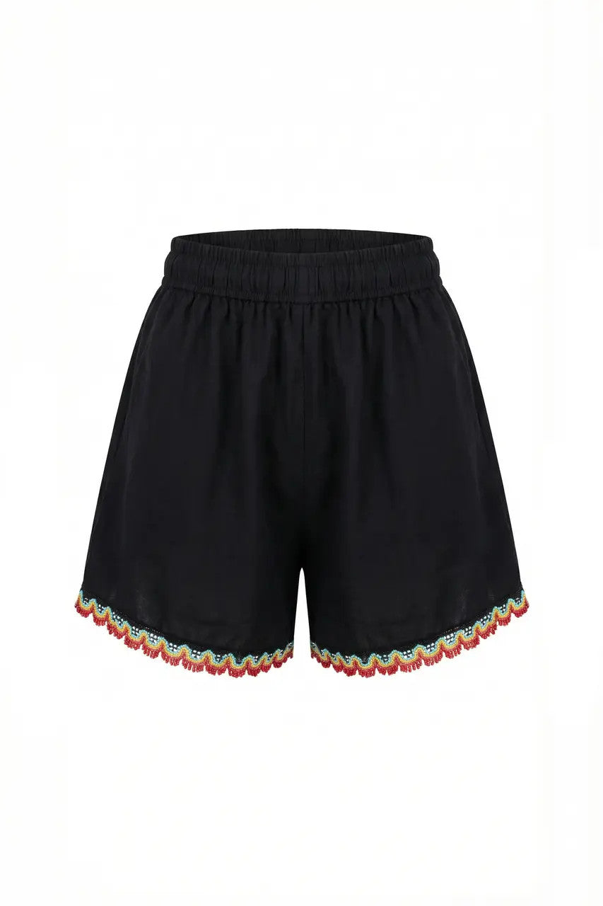 Shorts con ricami e nappe